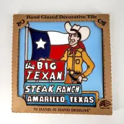 New in package: THE BIG TEXAN Steak Ranch Texas 7" red clay ceramic TILE TRIVET