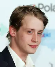 Actor Macaulay Culkin arrives at the launch of the uBid for Hurric - Old Photo 1