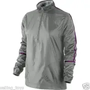 627189-047 New w tag Nike Women Windproof 1/2 zip golf or training Jacket shirt
