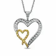 0.25 CT. T.W. Enhanced Yellow and White Natural Diamond Double Heart Pendant in Sterling Silver