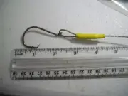 (12) 7/0 FISHING LEADERS WITH 7/0 CIRCLE HOOKS AND 3FT OF STAINLESS WIRE ROPE