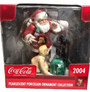 Coca Cola 2004 Pearlescent Porcelain Ornament. Santa w/child & dog. NIP
