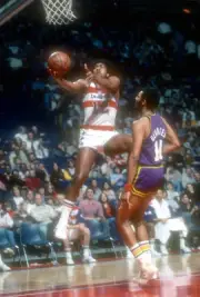 Leonard Gray Washington Bullets goes up for a layup over Ron Behag- Old Photo