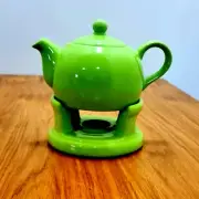 Bright green teapot with candlestick exclusive 2021 for a calm atmosphere