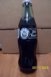 The Sumter Daily Item - 100 Years - Unopened Coca-Cola Bottle