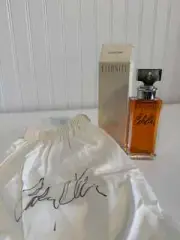 1988 Calvin Klein Boxer & Eternity Cologne Bottle both signed by Calvin Klein