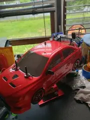 TAMIYA TT-01E STOCK CHASSIS WITH BODY