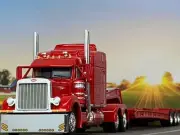 1/64 DCP RED PETERBILT 379 W/ 63" MID ROOF SLEEPER & TALBERT LOWBOY
