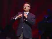 Alec Mapa performs on stage during Voices For The Voiceless Stars - Old Photo