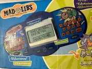 Excalibur Mad Libs Electronic Word Game LCD Handheld 2004 Great Travel Game