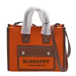 【BURBERRY 巴寶莉】經典品牌LOGO帆布皮革飾邊手提/斜背方包(橙棕褐色8055754)