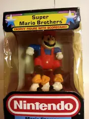 SUPER MARIO BROTHERS Mario Stomps the Goombas Trophy Figure W/ Scorecard 1988