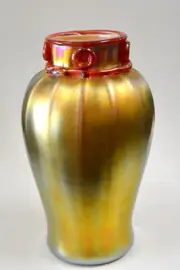 Gold Luster Vase With Red Necklace Design By Saul Alcaraz.