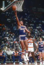 Ron Boone Kansas City Kings goes in for a layup v the Washington - 1976 Photo