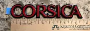 Chevrolet Corsica emblem NOS / $5 max combined shipping