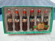 EVOLUTION OF THE COCA COLA SANTA 6 COLLECTIBLE COKE BOTTLE ORNAMENTS SERIES ONE