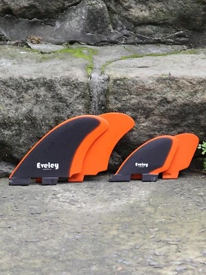 4.9" / 3.1" RM set of four fins black on deep orange Pro Glass FCSII compatible