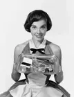 French American Actress Leslie Caron With A Tray Of Make Up Aids, - Old Photo