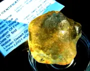 Libyan Desert Glass Meteorite Tektite impact Dimples ( 280 crt) Dark yellow Gem