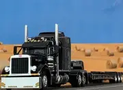 1/64 DCP BLACK PETERBILT 379 W/ 63" MID ROOF SLEEPER & TALBERT LOWBOY