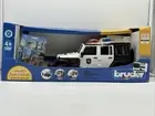Bruder 1:16 Scale Jeep Wrangler Police Vehicle With Policeman Toy
