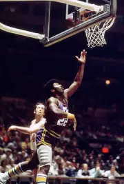 Nate Williams New Orleans Jazz shoots v the New York Knicks at an- 1976 Photo 1