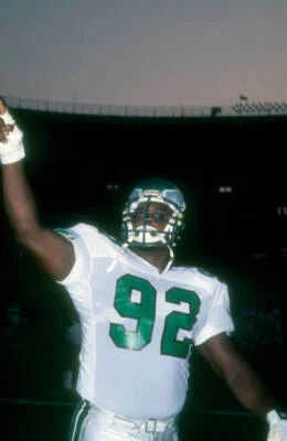 Defensive End Reggie White of the Philadelphia Eagles leads cheer - Old Photo