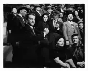 Paula Raymond and Cary Grant in audience standing up Crisis 1950 Old Photo