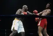 Joe Frazier Throws A Punch Against George Foreman Old Boxing Photo