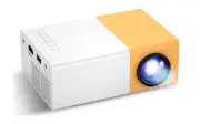 Portable LED Mini Home Theater Projector: Indoor / Outdoor Movie Theater Bundle