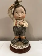 Vintage Giuseppe Armani 8" Gulliver's World Boy Combing Hair Figurine