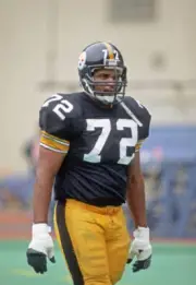 Offensive lineman Ray Snell of the Pittsburgh Steelers looks on - 1984 Old Photo
