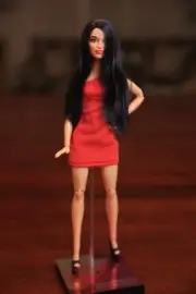 OOAK Latin beauty Barbie, dressed in red, with a made to move body.