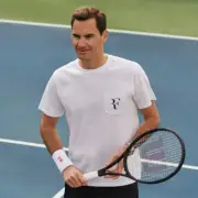 Uniqlo RF logo Graphic T Shirt Size XS White Short Sleeve Roger Federer