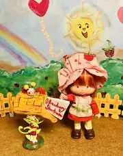 Strawberry Shortcake and her mailbox