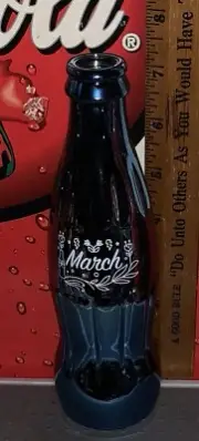 COCA - COLA BIRTHSTONE MONTH MARCH 8OZ AIR FILLED BLUE CHROME COKE BOTTLE