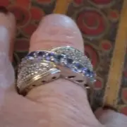 Chuck Clemency Tanzanite Cross Over Ring Set in .925 Sterling Size 6
