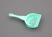 American Girl clumps of litter scoop from Cat Care Essentials for 18'' doll pet