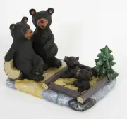 Bear Family Playing in a Sandbox