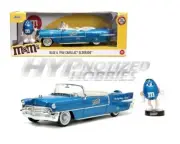 JADA 1:24 1956 CADILLAC ELDORADO WITH BLUE FIGURE M&M DIE-CAST BLUE 33726