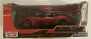 2019 NEW Aston Martin DB11 Copper Orange 1/24 Diecast Model Car by Motormax