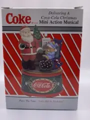 Coke, Coca-Cola~Delivering a Coca Cola Christmas~Enesco Action Musical~NEW~RARE