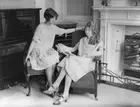 Two girls reading a book by the fireplace 1925 Old Photo