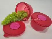TWO NEW RARE TUPPERWARE SHEER RED ROUND ROCK N SERVE!