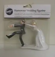 Wilton Wedding Cake Topper/Figurine: Bride Grabbing Fleeing Groom (New/Sealed)