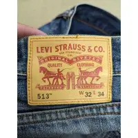 在飛比找蝦皮購物優惠-Levi's 513 日本製造 破壞縫補小直筒牛仔褲 33 