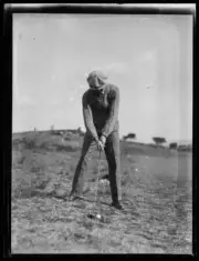 Golfer Hector Morrison lining up a tee, NSW, 4 August 1932, 2 Old Photo