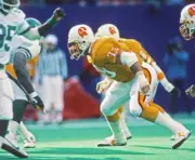 Defensive lineman John Cannon Tampa Bay Buccaneers pursues the pla- Old Photo