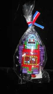 NEW 1993 Atomic Mr Robot Tin Light BIC lighter and Tin Litho Sleeve ~RED