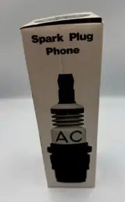 Vintage 80’s AC Spark Plug Touch Tone Novelty Phone. Super Cool.